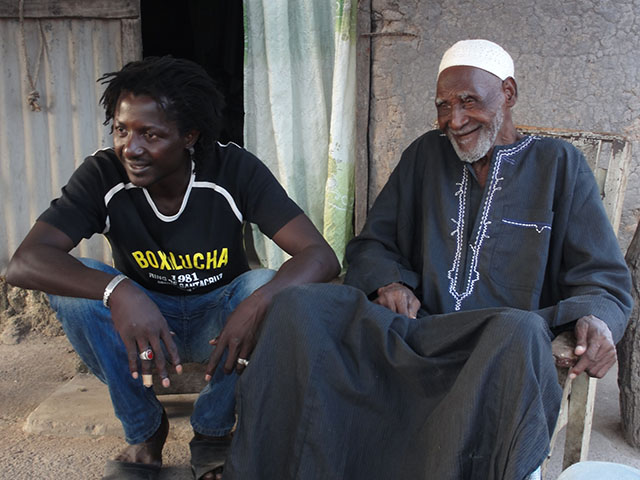 Owner of campement with village chief