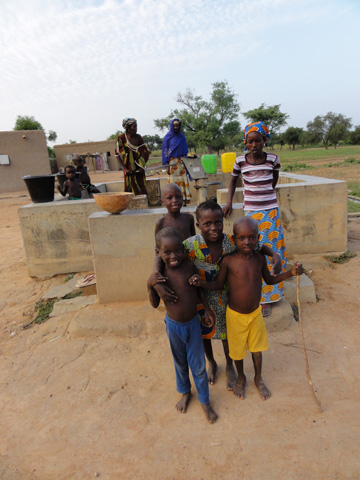 Children in front of the well